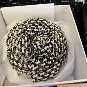 Chanel tweed camellia brooch